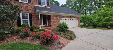 Situated on the 14th green of the newly renovated Forest Oaks on Forest Oaks Country Club in North Carolina - for sale on GolfHomes.com, golf home, golf lot