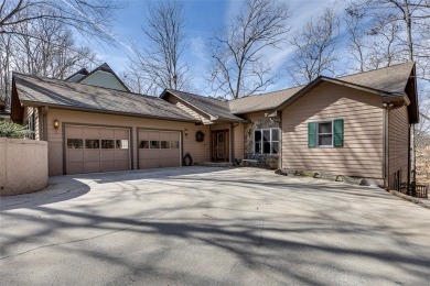 A lake house with a fabulous long range view! This custom built on Keowee Key Golf and Country Club in South Carolina - for sale on GolfHomes.com, golf home, golf lot