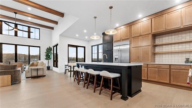 Recently completed by Thomas Construction, this luxury residence on The Oaks Golf Course in Missouri - for sale on GolfHomes.com, golf home, golf lot