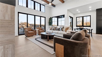 Recently completed by Thomas Construction, this luxury residence on The Oaks Golf Course in Missouri - for sale on GolfHomes.com, golf home, golf lot