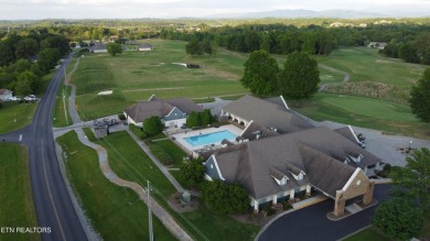 Level lot with golf course view on Tellico Village -The Links At Kahite Golf Course in Tennessee - for sale on GolfHomes.com, golf home, golf lot