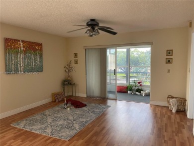 This  55+ Resort like 2 bedroom 2 bath corner unit offers on Sunrise Lakes Phase III in Florida - for sale on GolfHomes.com, golf home, golf lot