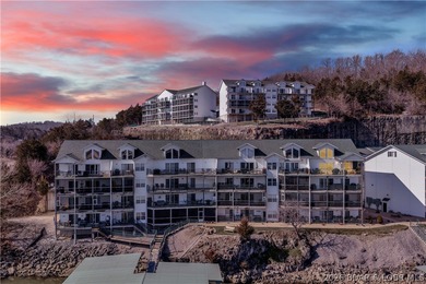 Experience lake living in this 4-bedroom, 2-bath penthouse on The Club At Old Kinderhook in Missouri - for sale on GolfHomes.com, golf home, golf lot