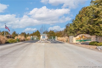 Experience lake living in this 4-bedroom, 2-bath penthouse on The Club At Old Kinderhook in Missouri - for sale on GolfHomes.com, golf home, golf lot
