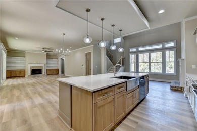 Step into refined luxury at 2881 Traditions Way in the on Traditions of Braselton Golf Club in Georgia - for sale on GolfHomes.com, golf home, golf lot