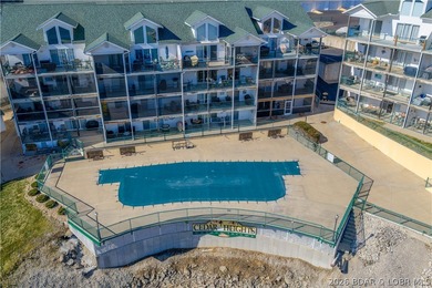 Experience lake living in this 4-bedroom, 2-bath penthouse on The Club At Old Kinderhook in Missouri - for sale on GolfHomes.com, golf home, golf lot