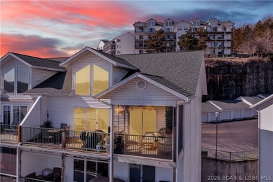 Experience lake living in this 4-bedroom, 2-bath penthouse on The Club At Old Kinderhook in Missouri - for sale on GolfHomes.com, golf home, golf lot