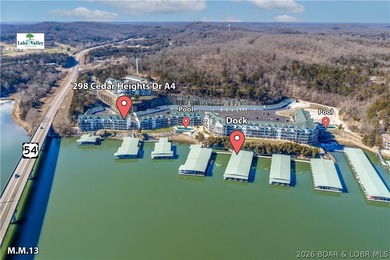 Experience lake living in this 4-bedroom, 2-bath penthouse on The Club At Old Kinderhook in Missouri - for sale on GolfHomes.com, golf home, golf lot