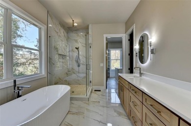 Step into refined luxury at 2881 Traditions Way in the on Traditions of Braselton Golf Club in Georgia - for sale on GolfHomes.com, golf home, golf lot