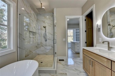 Step into refined luxury at 2881 Traditions Way in the on Traditions of Braselton Golf Club in Georgia - for sale on GolfHomes.com, golf home, golf lot