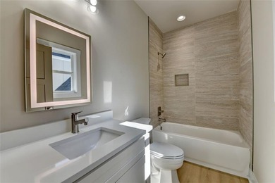 Step into refined luxury at 2881 Traditions Way in the on Traditions of Braselton Golf Club in Georgia - for sale on GolfHomes.com, golf home, golf lot