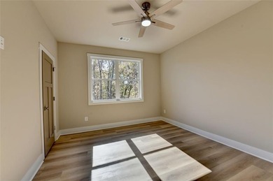 Step into refined luxury at 2881 Traditions Way in the on Traditions of Braselton Golf Club in Georgia - for sale on GolfHomes.com, golf home, golf lot