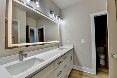 Step into refined luxury at 2881 Traditions Way in the on Traditions of Braselton Golf Club in Georgia - for sale on GolfHomes.com, golf home, golf lot