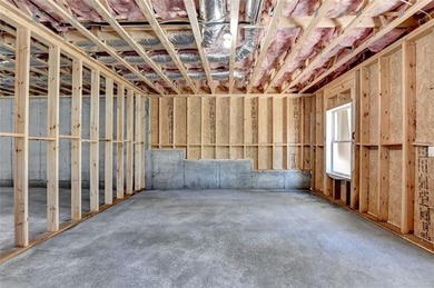 Step into refined luxury at 2881 Traditions Way in the on Traditions of Braselton Golf Club in Georgia - for sale on GolfHomes.com, golf home, golf lot