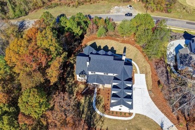 Step into refined luxury at 2881 Traditions Way in the on Traditions of Braselton Golf Club in Georgia - for sale on GolfHomes.com, golf home, golf lot