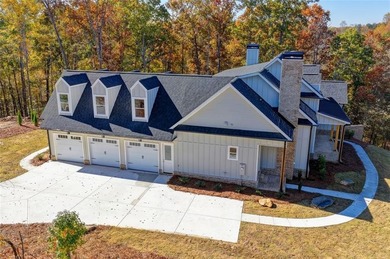 Step into refined luxury at 2881 Traditions Way in the on Traditions of Braselton Golf Club in Georgia - for sale on GolfHomes.com, golf home, golf lot