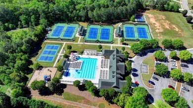 Step into refined luxury at 2881 Traditions Way in the on Traditions of Braselton Golf Club in Georgia - for sale on GolfHomes.com, golf home, golf lot