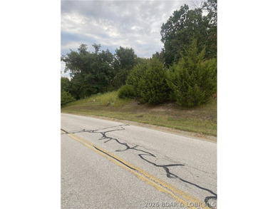 Prime Building Opportunity in Country Club Cove! Located in the on Seasons Ridge At Four Seasons in Missouri - for sale on GolfHomes.com, golf home, golf lot