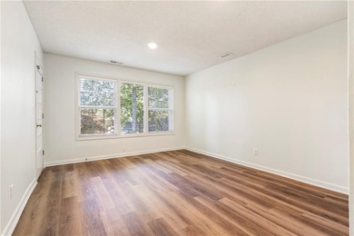 Affordable, end unit townhome! 3 bedrooms, plus a flex room.  2 on Bella Vista Country Club and Golf Course in Arkansas - for sale on GolfHomes.com, golf home, golf lot