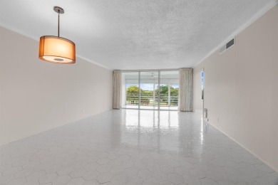 This spacious 5th-floor, 3 Beds, 2 Baths, condo offers 1,500 on Palm-Aire Country Club and Resort - Palms in Florida - for sale on GolfHomes.com, golf home, golf lot