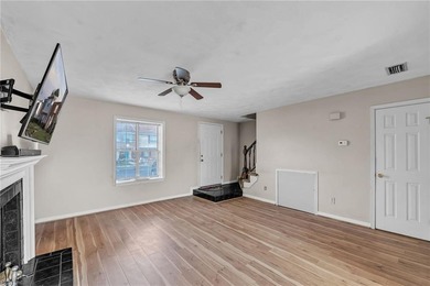 Welcome home to this charming 2-bedroom, 1.5-bath end-unit on Greenbrier Country Club in Virginia - for sale on GolfHomes.com, golf home, golf lot