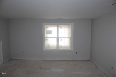 Experience the ultimate resort lifestyle in this move-in ready on River Golf and Country Club at Lake Royale in North Carolina - for sale on GolfHomes.com, golf home, golf lot