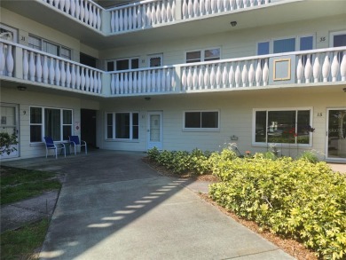 GROUND FLOOR 2 bedroom/2 bath condo on WEST side of Belcher that on On Top Of The World Golf Course in Florida - for sale on GolfHomes.com, golf home, golf lot