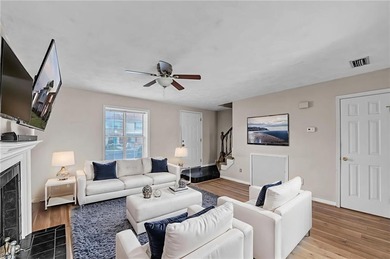 Welcome home to this charming 2-bedroom, 1.5-bath end-unit on Greenbrier Country Club in Virginia - for sale on GolfHomes.com, golf home, golf lot