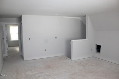 Experience the ultimate resort lifestyle in this move-in ready on River Golf and Country Club at Lake Royale in North Carolina - for sale on GolfHomes.com, golf home, golf lot