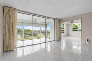 This spacious 5th-floor, 3 Beds, 2 Baths, condo offers 1,500 on Palm-Aire Country Club and Resort - Palms in Florida - for sale on GolfHomes.com, golf home, golf lot