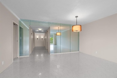 This spacious 5th-floor, 3 Beds, 2 Baths, condo offers 1,500 on Palm-Aire Country Club and Resort - Palms in Florida - for sale on GolfHomes.com, golf home, golf lot