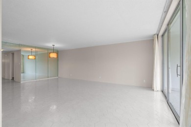 This spacious 5th-floor, 3 Beds, 2 Baths, condo offers 1,500 on Palm-Aire Country Club and Resort - Palms in Florida - for sale on GolfHomes.com, golf home, golf lot