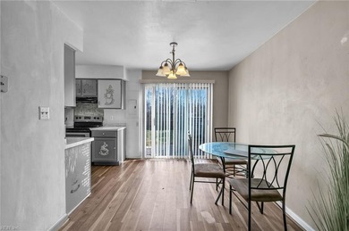 Welcome home to this charming 2-bedroom, 1.5-bath end-unit on Greenbrier Country Club in Virginia - for sale on GolfHomes.com, golf home, golf lot