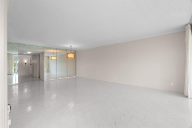 This spacious 5th-floor, 3 Beds, 2 Baths, condo offers 1,500 on Palm-Aire Country Club and Resort - Palms in Florida - for sale on GolfHomes.com, golf home, golf lot