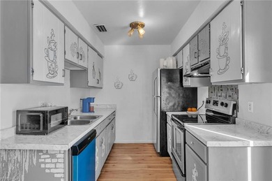 Welcome home to this charming 2-bedroom, 1.5-bath end-unit on Greenbrier Country Club in Virginia - for sale on GolfHomes.com, golf home, golf lot