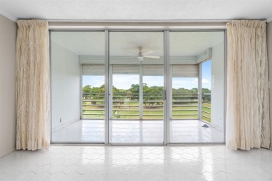 This spacious 5th-floor, 3 Beds, 2 Baths, condo offers 1,500 on Palm-Aire Country Club and Resort - Palms in Florida - for sale on GolfHomes.com, golf home, golf lot