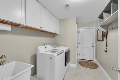 Built in 2019, this beautifully maintained craftsman-style home on Woodfin Ridge Golf Club in South Carolina - for sale on GolfHomes.com, golf home, golf lot