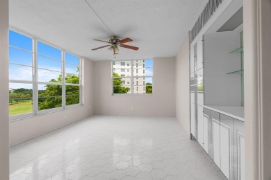 This spacious 5th-floor, 3 Beds, 2 Baths, condo offers 1,500 on Palm-Aire Country Club and Resort - Palms in Florida - for sale on GolfHomes.com, golf home, golf lot