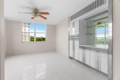 This spacious 5th-floor, 3 Beds, 2 Baths, condo offers 1,500 on Palm-Aire Country Club and Resort - Palms in Florida - for sale on GolfHomes.com, golf home, golf lot