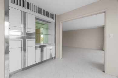 This spacious 5th-floor, 3 Beds, 2 Baths, condo offers 1,500 on Palm-Aire Country Club and Resort - Palms in Florida - for sale on GolfHomes.com, golf home, golf lot
