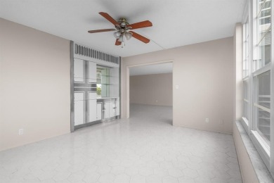 This spacious 5th-floor, 3 Beds, 2 Baths, condo offers 1,500 on Palm-Aire Country Club and Resort - Palms in Florida - for sale on GolfHomes.com, golf home, golf lot
