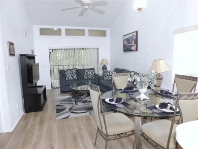 Come home every evening, relax on your screen enclosed oversized on East Lake Woodlands Country Club in Florida - for sale on GolfHomes.com, golf home, golf lot
