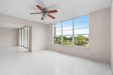 This spacious 5th-floor, 3 Beds, 2 Baths, condo offers 1,500 on Palm-Aire Country Club and Resort - Palms in Florida - for sale on GolfHomes.com, golf home, golf lot