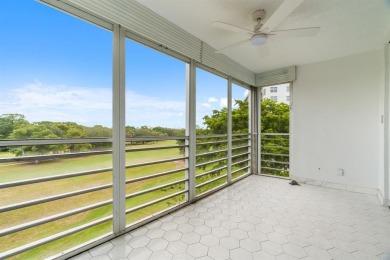 This spacious 5th-floor, 3 Beds, 2 Baths, condo offers 1,500 on Palm-Aire Country Club and Resort - Palms in Florida - for sale on GolfHomes.com, golf home, golf lot