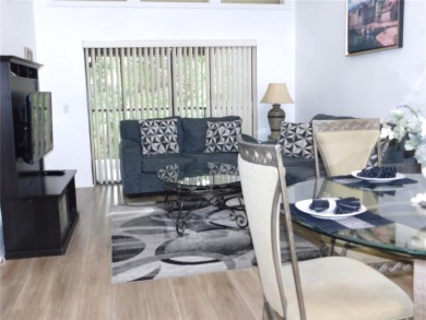 Come home every evening, relax on your screen enclosed oversized on East Lake Woodlands Country Club in Florida - for sale on GolfHomes.com, golf home, golf lot