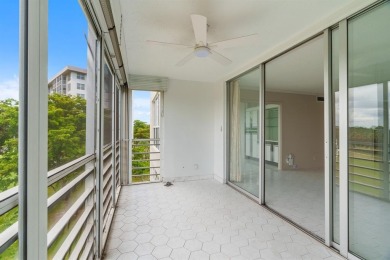 This spacious 5th-floor, 3 Beds, 2 Baths, condo offers 1,500 on Palm-Aire Country Club and Resort - Palms in Florida - for sale on GolfHomes.com, golf home, golf lot