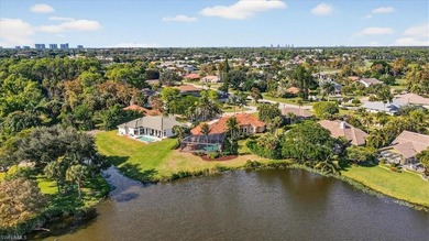 Lakefront and beautifully crafted, this custom-built home sits on Imperial Golf Club in Florida - for sale on GolfHomes.com, golf home, golf lot
