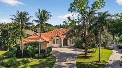 Lakefront and beautifully crafted, this custom-built home sits on Imperial Golf Club in Florida - for sale on GolfHomes.com, golf home, golf lot