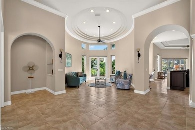 Lakefront and beautifully crafted, this custom-built home sits on Imperial Golf Club in Florida - for sale on GolfHomes.com, golf home, golf lot