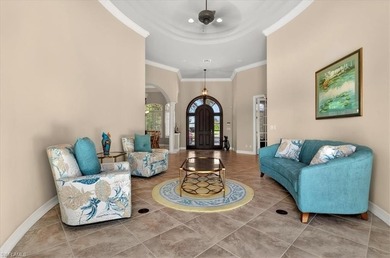 Lakefront and beautifully crafted, this custom-built home sits on Imperial Golf Club in Florida - for sale on GolfHomes.com, golf home, golf lot